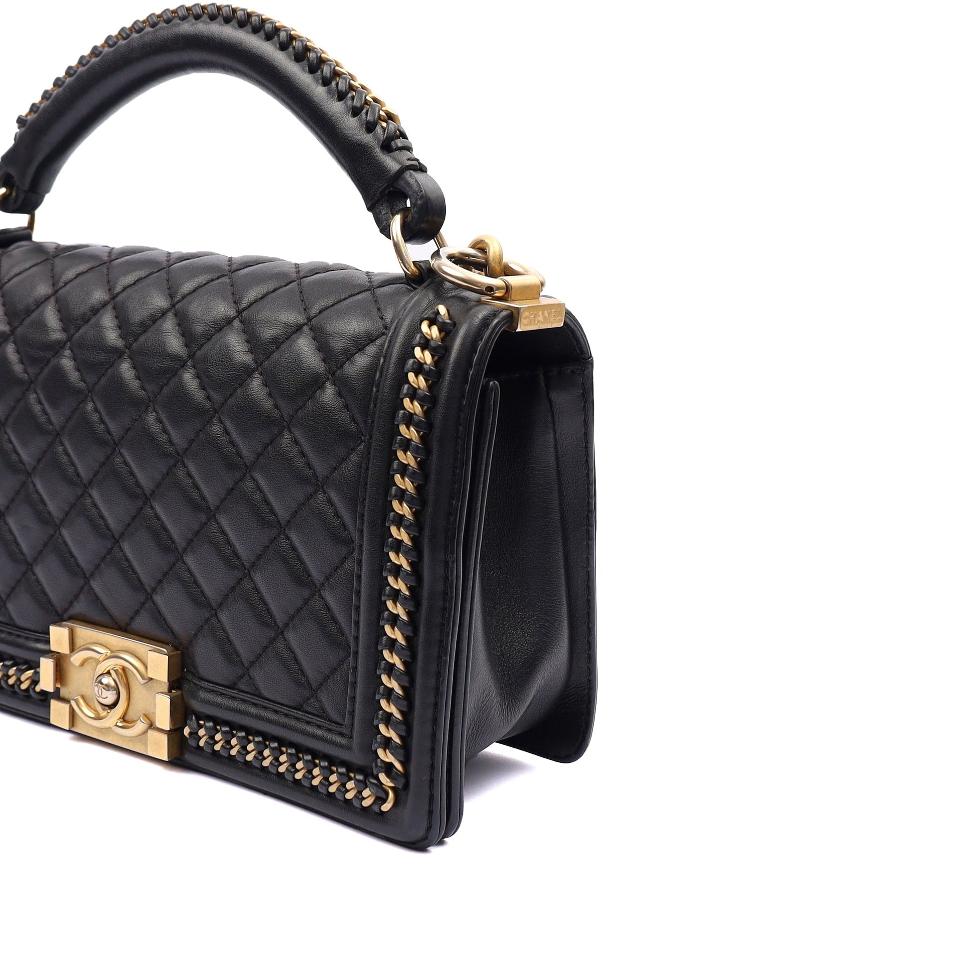 Chanel Shoulder Bag Boy Top Handle - Medium in Black, Calfskin Leather — Lifestyle View