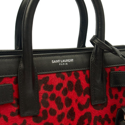 Saint Laurent Tote Sac de Jour Nano in Black, Calfskin Leather — Lifestyle View