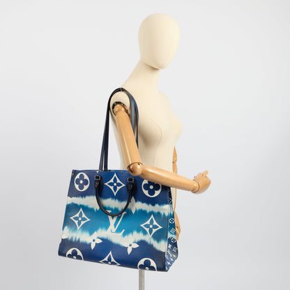 Louis Vuitton Tote On The Go GM in Blue, Leather — Side View