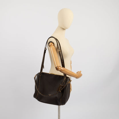 Louis Vuitton Tote Express MM in Brown, Leather — Side View