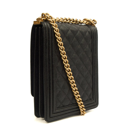 Chanel Shoulder Bag North South Boy in Black, Caviar Leather — Side View