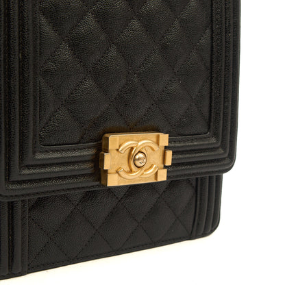 Chanel Shoulder Bag North South Boy in Black, Caviar Leather — Lifestyle View