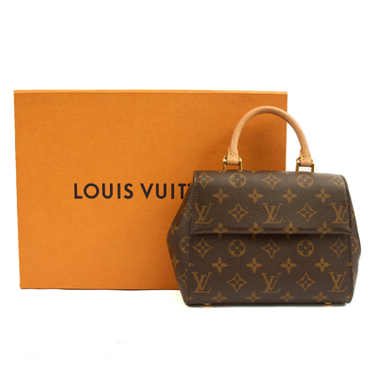 Louis Vuitton Top Handle Cluny MM in Monogram, Canvas — Side View