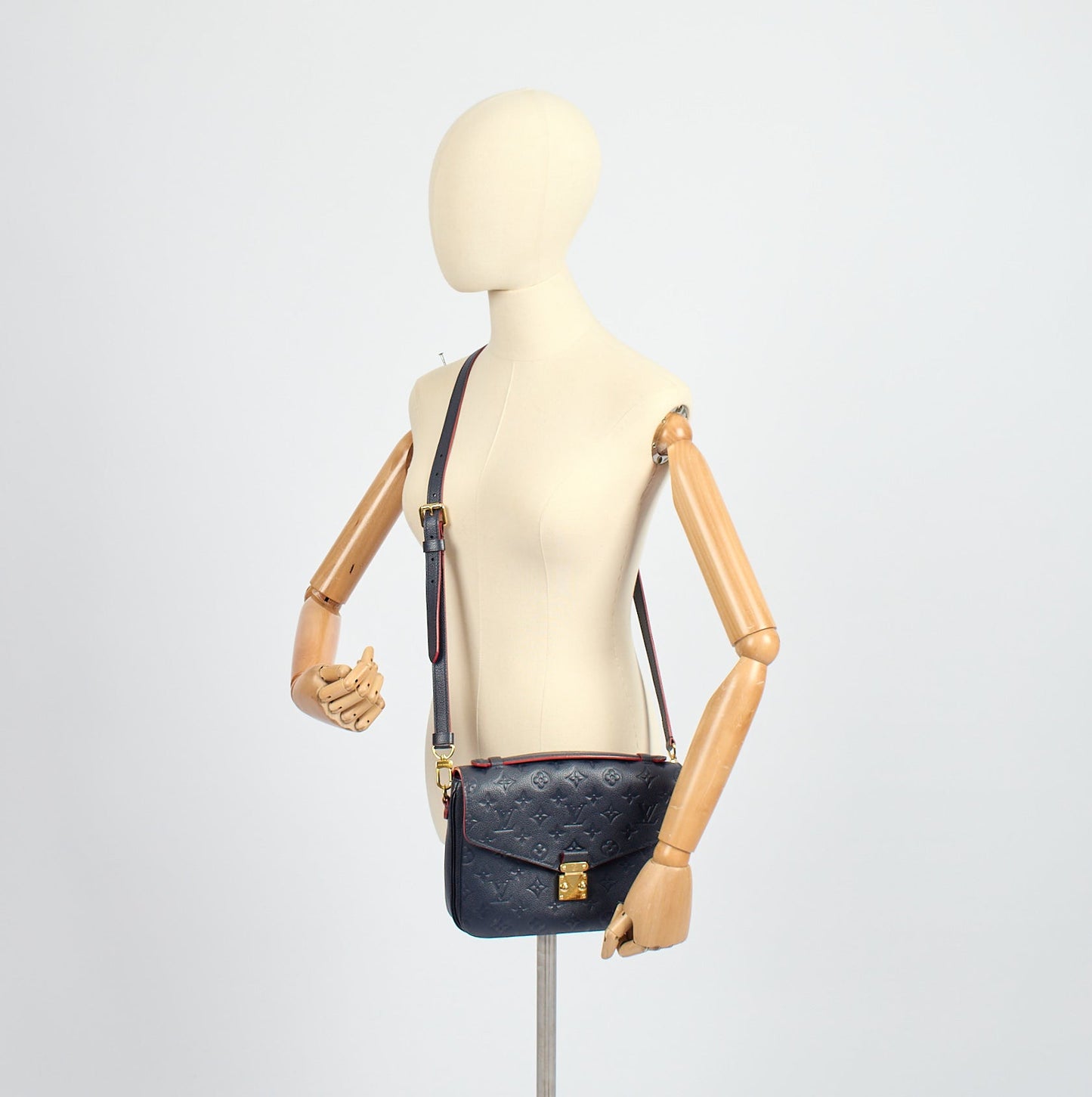 Louis Vuitton Cross Body Pochette Metis in Navy, Empreinte Leather — Side View