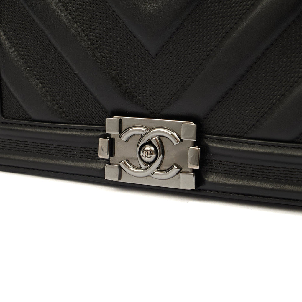 Chanel Shoulder Bag Boy - Medium in Black, Calfskin Leather — Lifestyle View