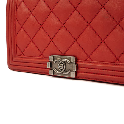 Chanel Shoulder Bag Boy - Medium in Red, Calfskin Leather — Lifestyle View