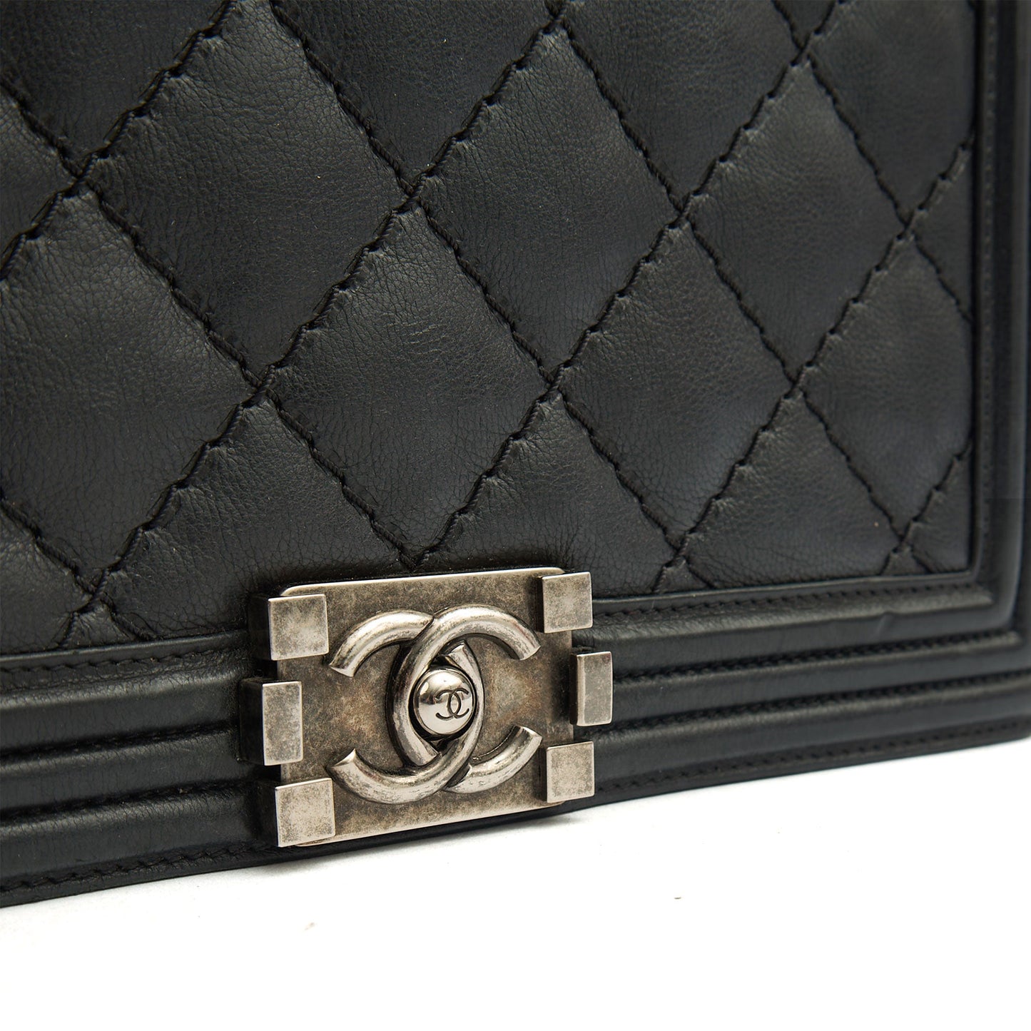 Chanel Shoulder Bag Boy - New Medium in Black, Calfskin Leather — Lifestyle View