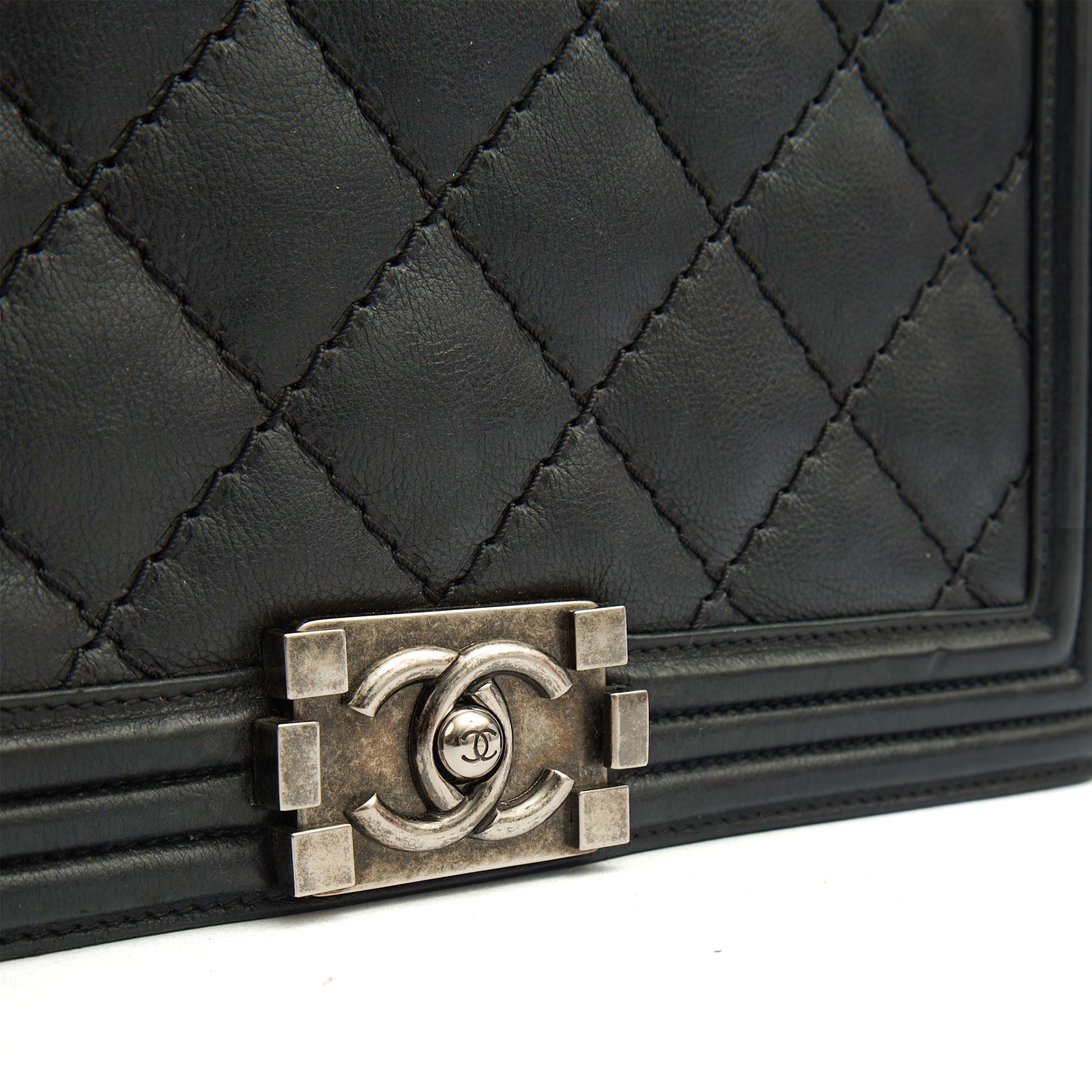 Chanel Shoulder Bag Boy - New Medium in Black, Calfskin Leather — Lifestyle View