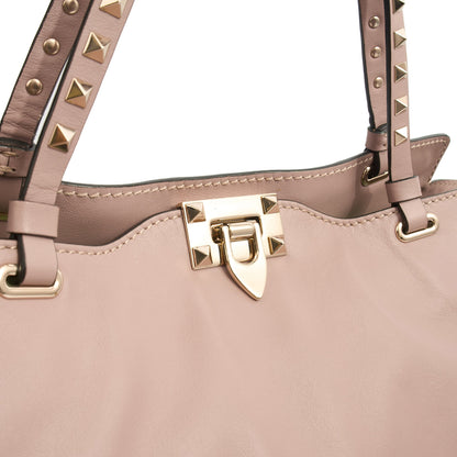 Valentino Tote Rockstud Lock Medium in Pink, Calfskin — Lifestyle View