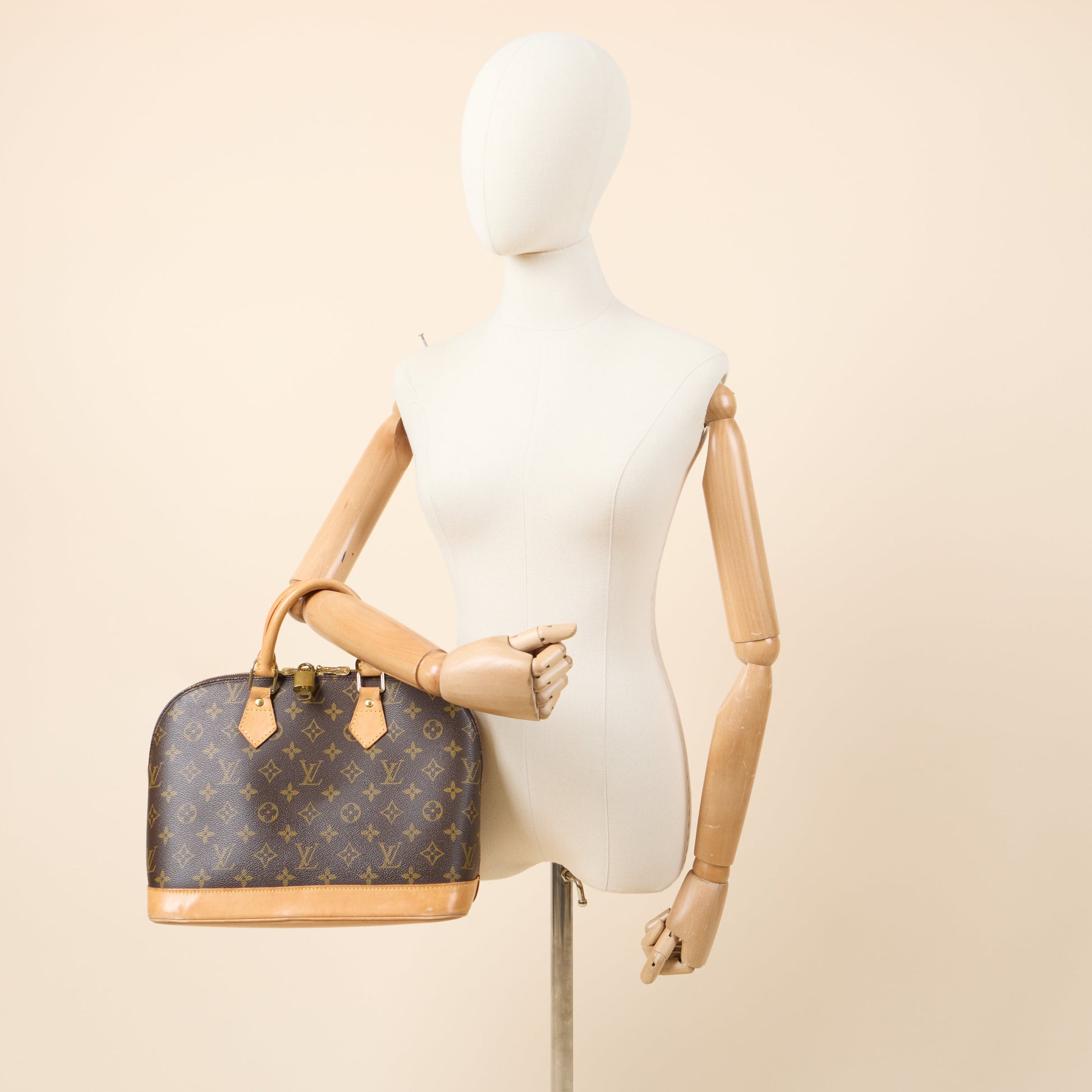 Louis Vuitton Top Handle Alma PM in Monogram, Canvas — Side View