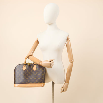 Louis Vuitton Top Handle Alma PM in Monogram, Canvas — Side View