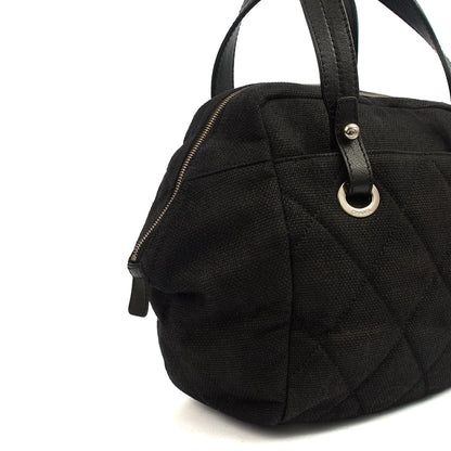 Chanel Top Handle Bowler in Black, Fabric — Lifestyle View