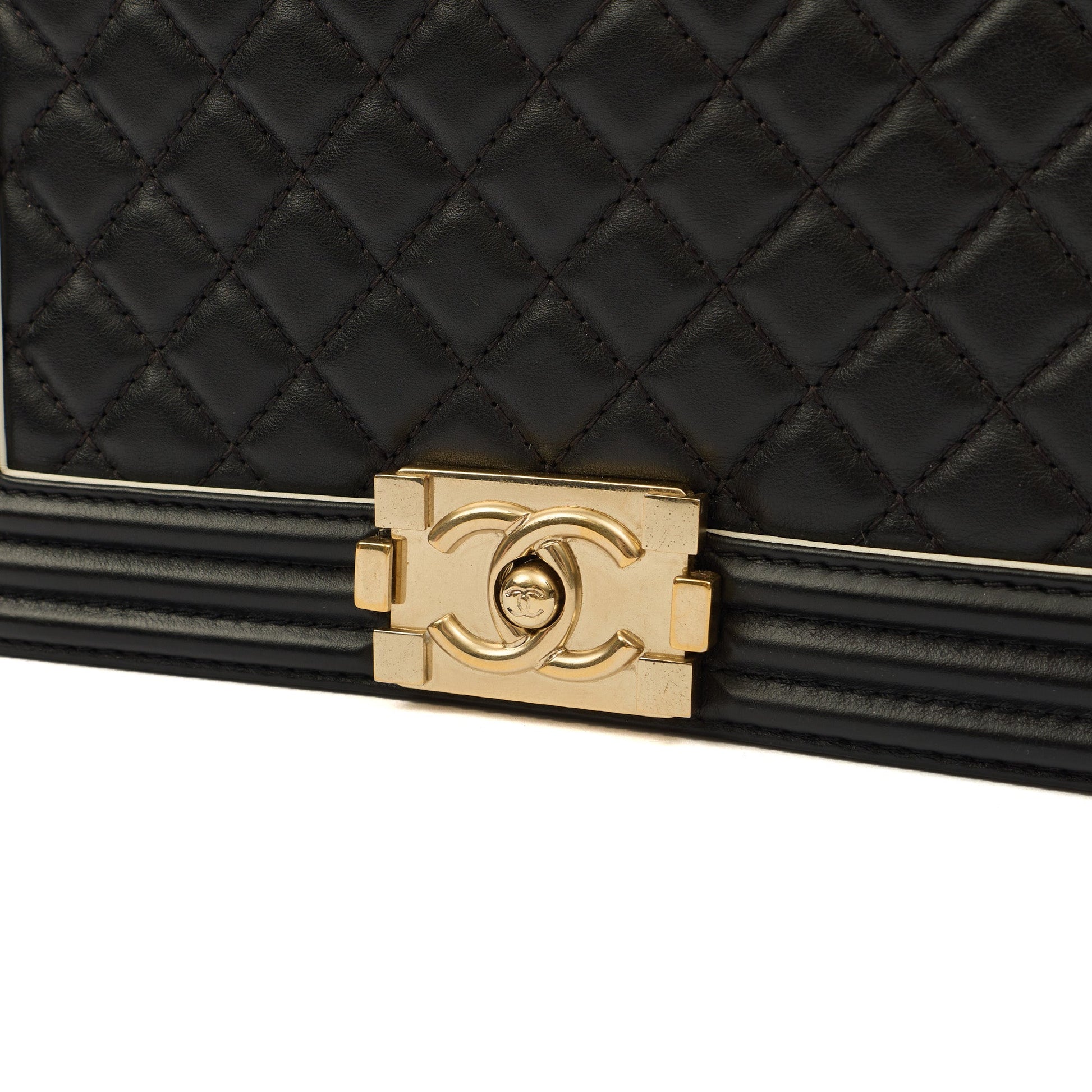 Chanel Cross Body Boy Top Handle - Medium in Black, Calfskin Leather — Side View