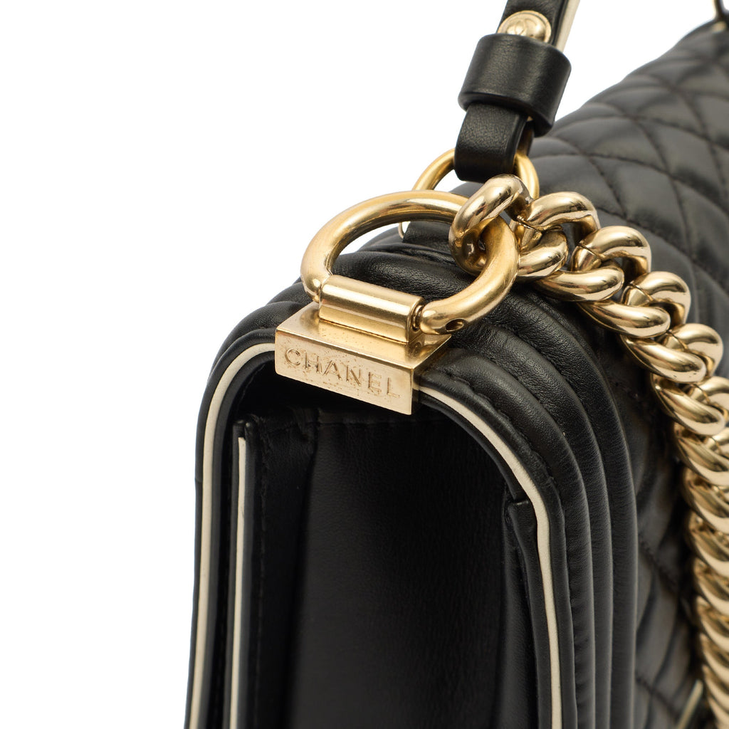 Chanel Cross Body Boy Top Handle - Medium in Black, Calfskin Leather — Lifestyle View