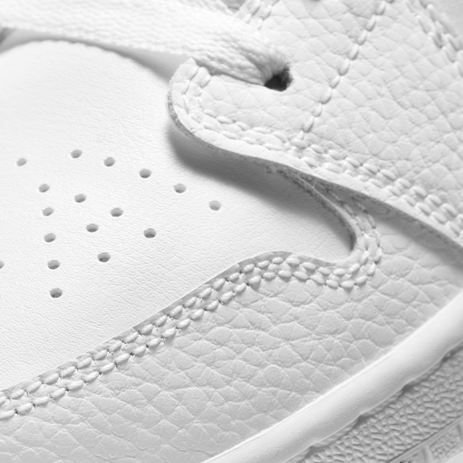 Air Jordan 1 Low GS 'Triple White' — UK 13.5 | EU 32 | US 1Y — Lifestyle View