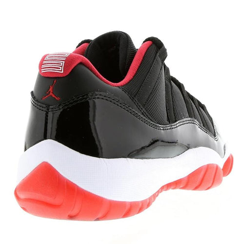 Air Jordan 11 Retro Low GS 'Bred' — UK 13.5 | EU 32 | US 1Y — Side View