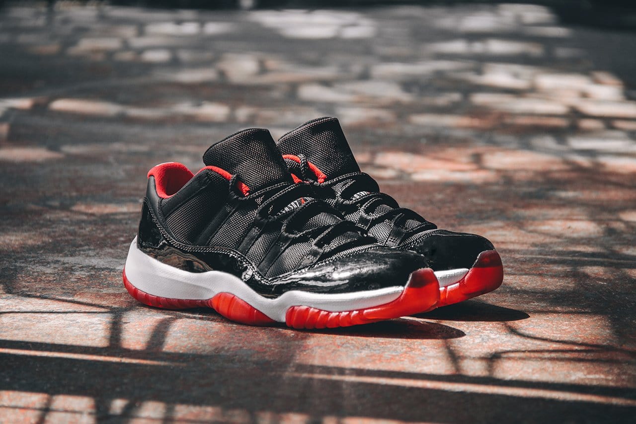 Air Jordan 11 Retro Low GS 'Bred' — UK 13.5 | EU 32 | US 1Y — Lifestyle View