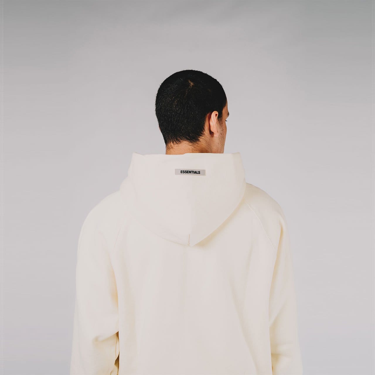 FEAR OF GOD ESSENTIALS 3D Silicon Applique Crewneck Buttercream — XXS — Lifestyle View