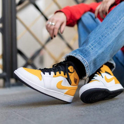 Air Jordan 1 Mid GS 'University Gold' — UK 13.5 | EU 32 | US 1Y — Lifestyle View