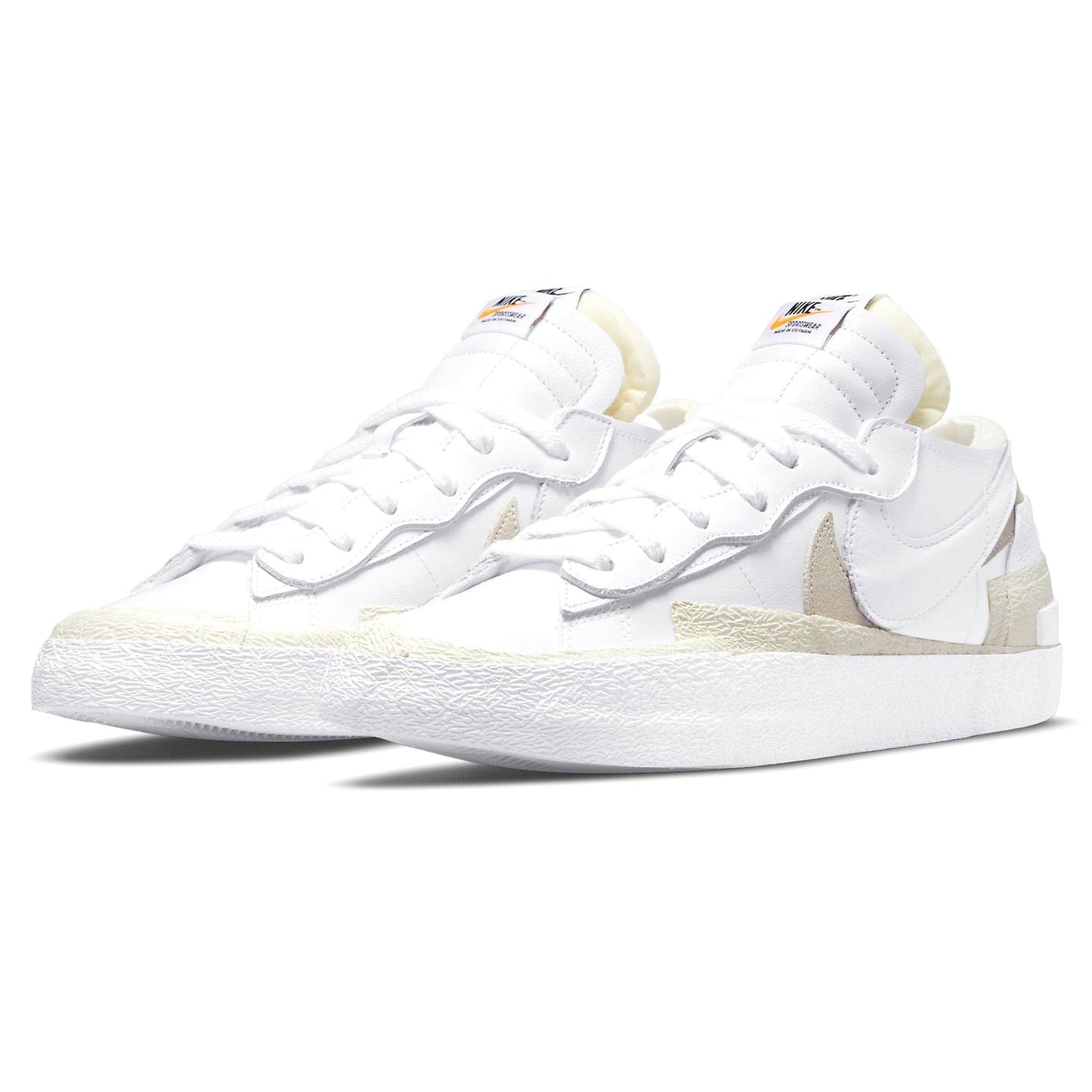 Kaws x sacai x Nike Blazer Low 'White Patent' — UK 3 | EU 35.5 | US 3.5 — Side View