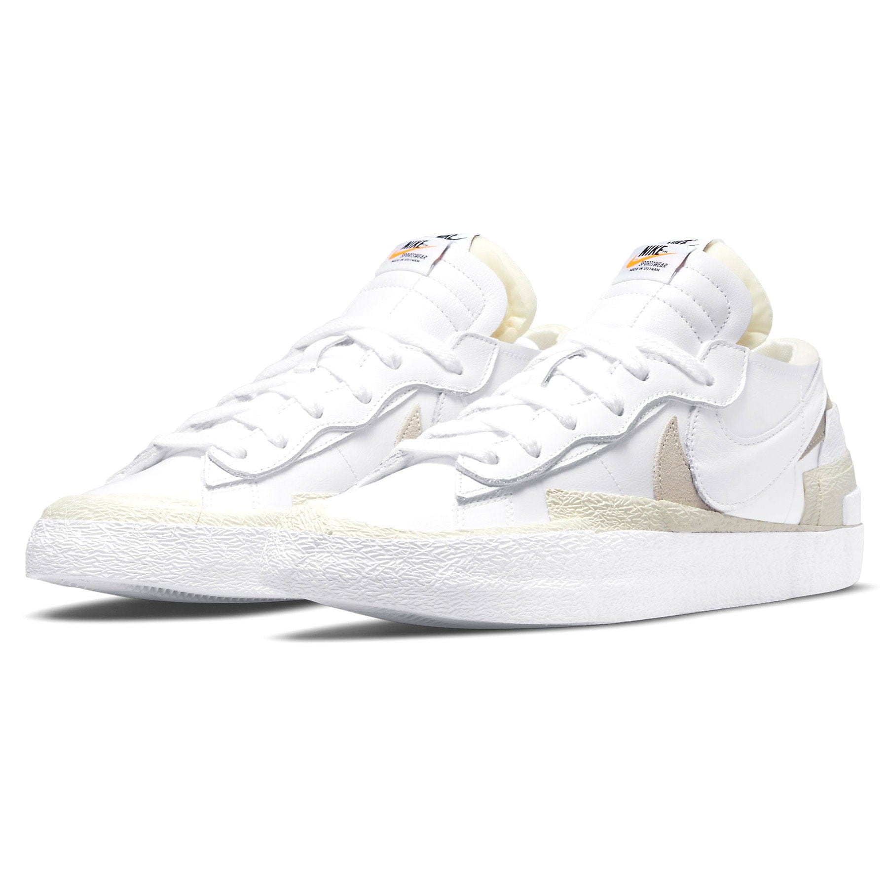 Kaws x sacai x Nike Blazer Low 'White Patent' — UK 3 | EU 35.5 | US 3.5 — Side View