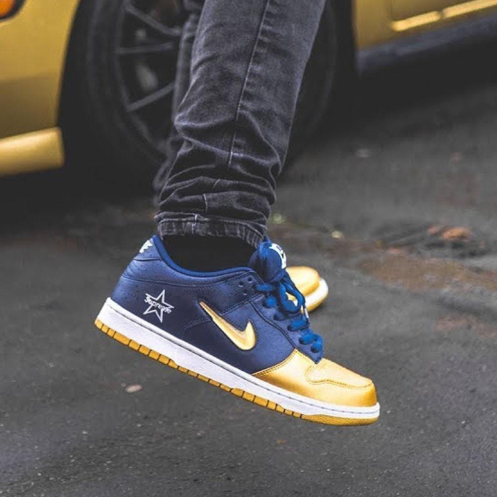 Supreme x Nike Dunk SB Low QS 'Metallic Gold' — UK 3 | EU 35.5 | US 3.5 — Lifestyle View