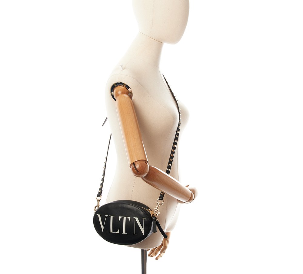 Valentino Cross Body V Logo Crossbody in Black, Calfskin — Lifestyle View