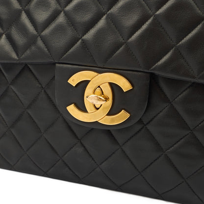 Chanel Shoulder Bag Maxi Jumbo XL in Black, Lambskin Leather — Lifestyle View
